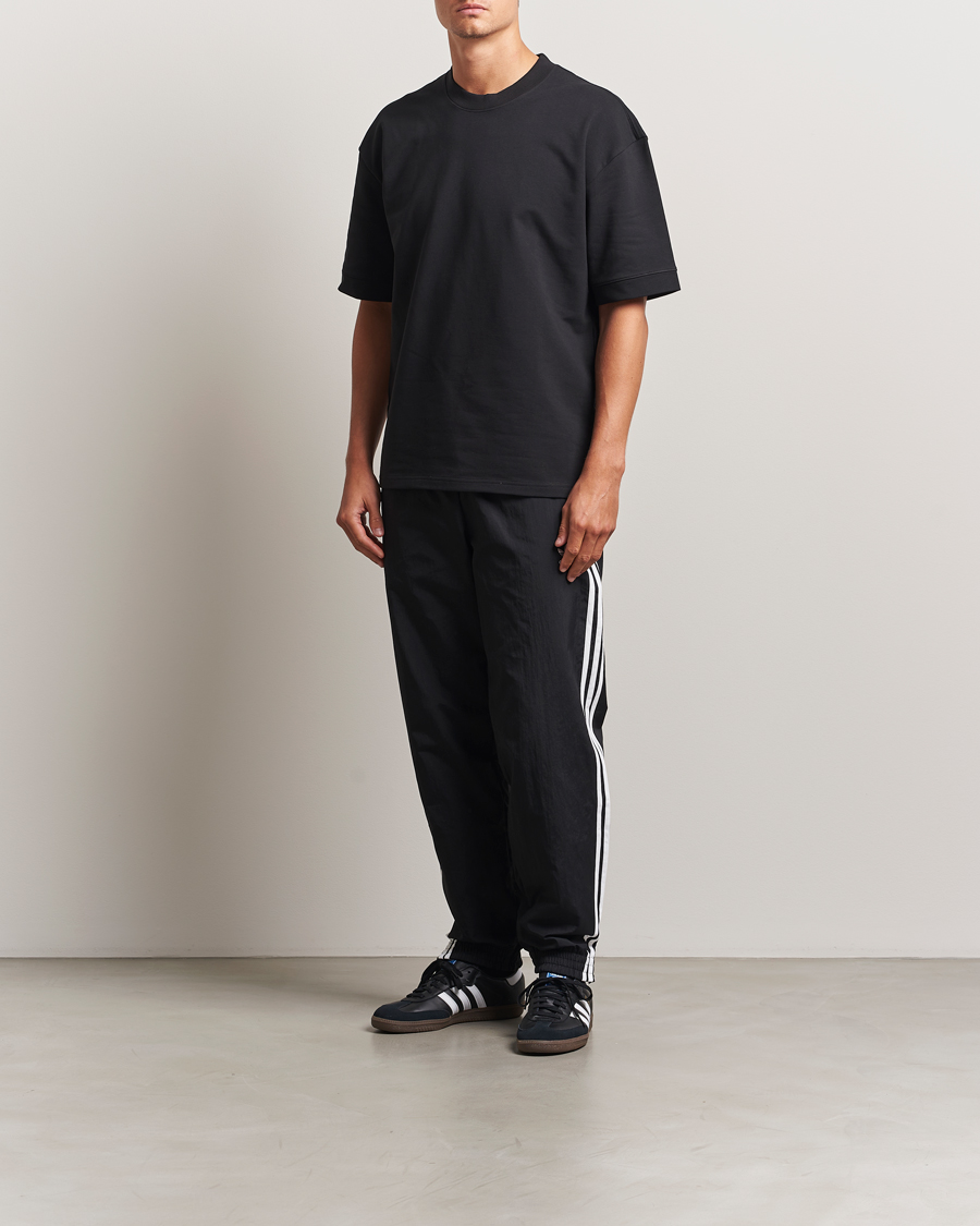 Heren | Broeken | adidas Originals | Firebird Track Pants Black/White
