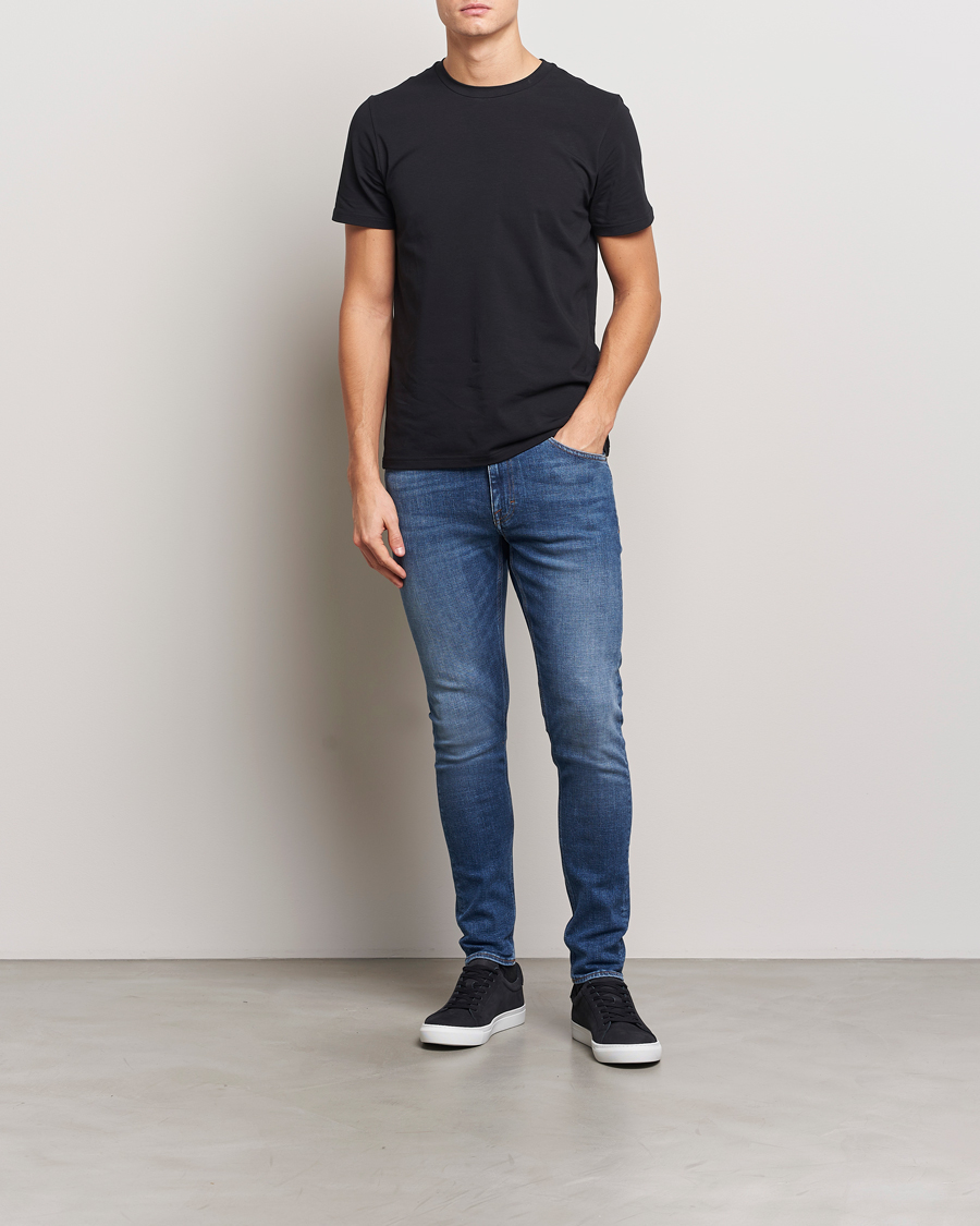 Heren | Jeans | Tiger of Sweden | Evolve Stretch Cotton Jeans Medium Blue