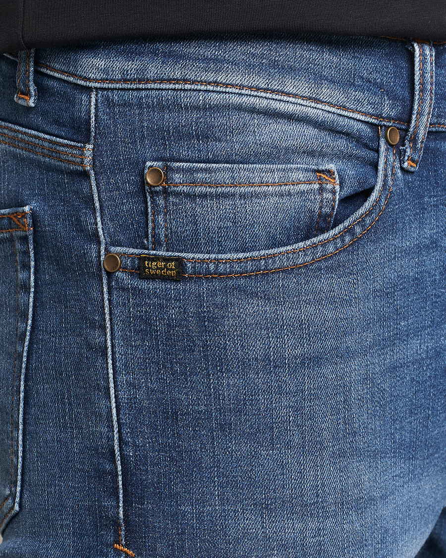 Heren | Jeans | Tiger of Sweden | Evolve Stretch Cotton Jeans Medium Blue