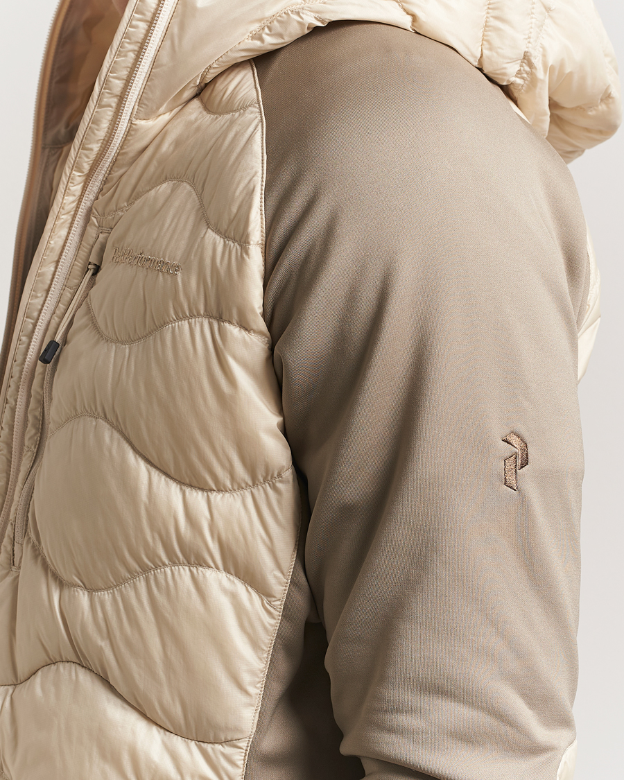 Heren | Jassen | Peak Performance | Helium Down Hooded Hybrid Jacket Sand Fog